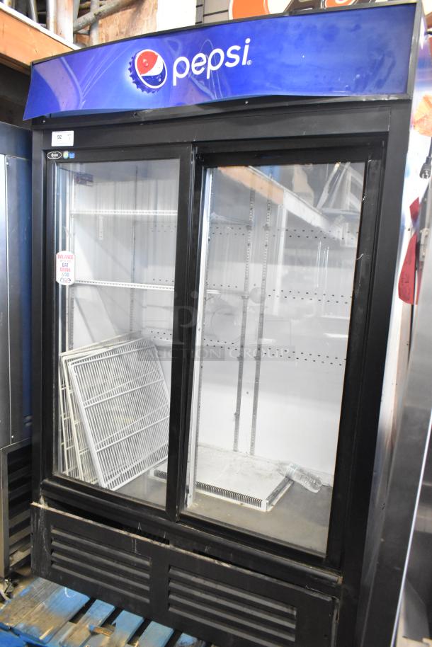 QBD CD45-HC Metal Commercial 2-Door Cooler with poly-coated racks, Pepsi branding, 115 volts, in good condition.
