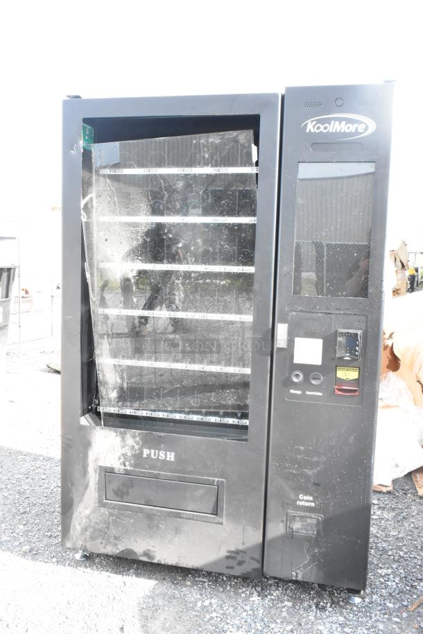 BRAND NEW KoolMore KM-VMNT-50-BR vending machine, 60 slots, visible scratches and dents, non-refrigerated, black finish.