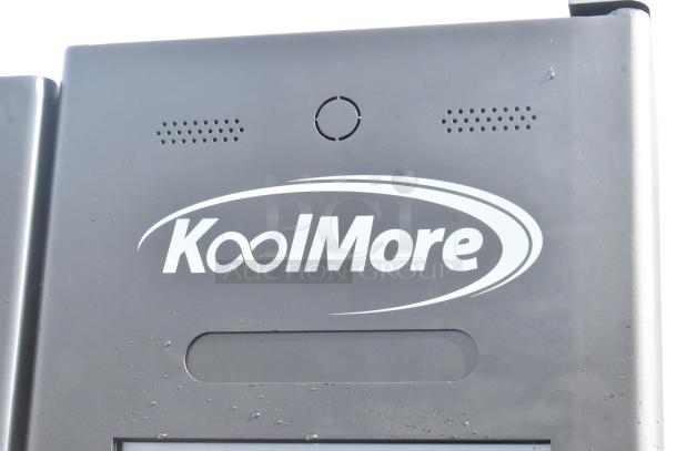 KoolMore KM-VMNT-50-BR non-refrigerated vending machine, 60 slots, brand new, minor scratches, KoolMore logo visible.