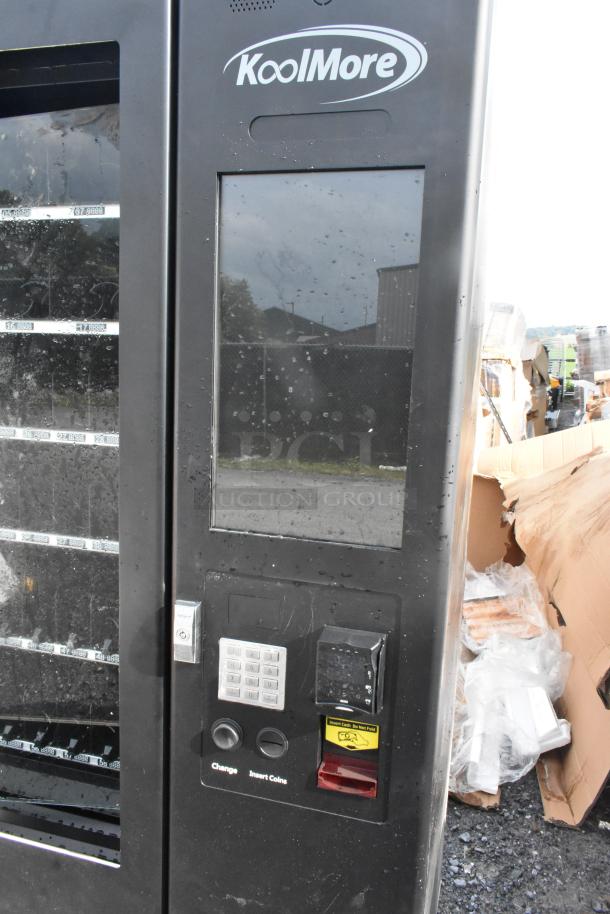BRAND NEW KoolMore KM-VMNT-50-BR non-refrigerated vending machine, 60 slots, scratch and dent condition.