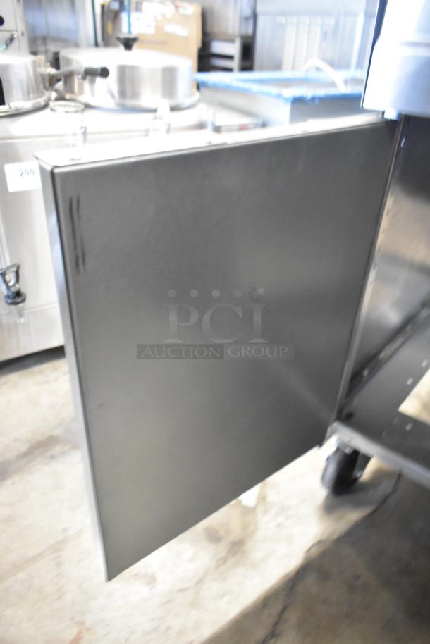 BRAND NEW Frymaster stainless steel commercial dump station on casters, scratch and dent condition, heavy-duty build.