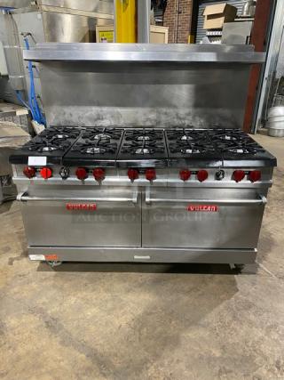 Vulcan stainless steel 10 burner commercial range with double oven, backsplash, salamander shelf, and casters.