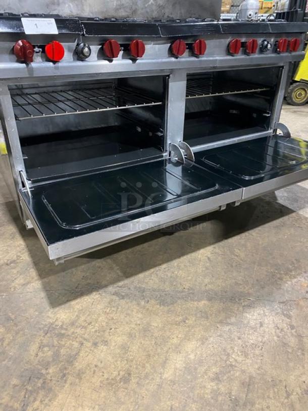 Vulcan stainless steel natural gas 10 burner range with double ovens. Includes backsplash, overhead salamander shelf, wire rack, on casters.