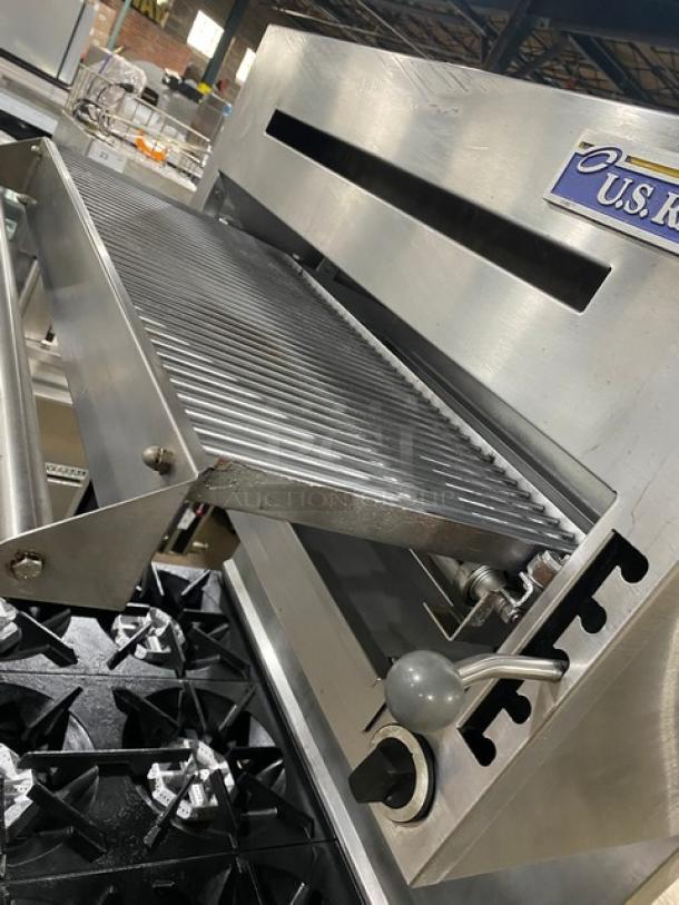 Garland SunFire Series 6 Burner Range/Oven with U.S. Range Salamander Broiler, stainless steel, model SX626, on casters.