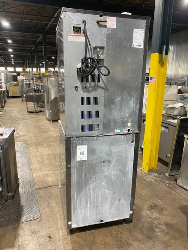 Hoshizaki KM-1340MRJ/B-500PF ice machine, stainless steel, crescent cube style, electric, 208-230V, on legs, visible wear.