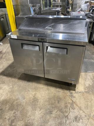 Atosa MSF8302 refrigerated prep table with 2 doors, stainless steel finish, poly coated rack, on casters, 115V 1 Phase.