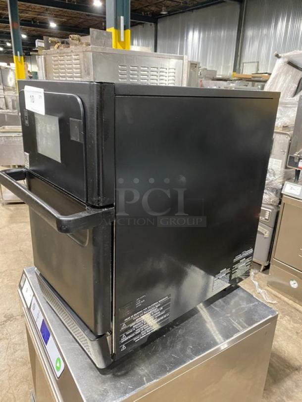 MerryChef Eikon E2S black electric countertop high-speed rapid cook oven, 208/240V, 1 phase, in good condition.