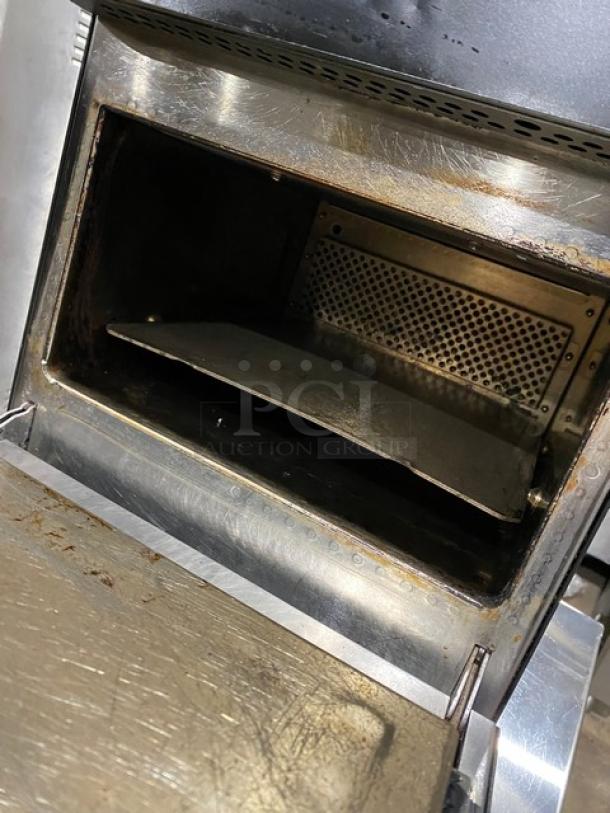 MerryChef Eikon E2S black electric countertop high-speed oven. Late model, used condition, 208/240V, 1 Phase.
