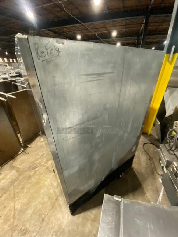 US Refrigeration USBV-48R 2-door stainless steel refrigerator in warehouse. Includes poly-coated wire rack. Model USBV48R.