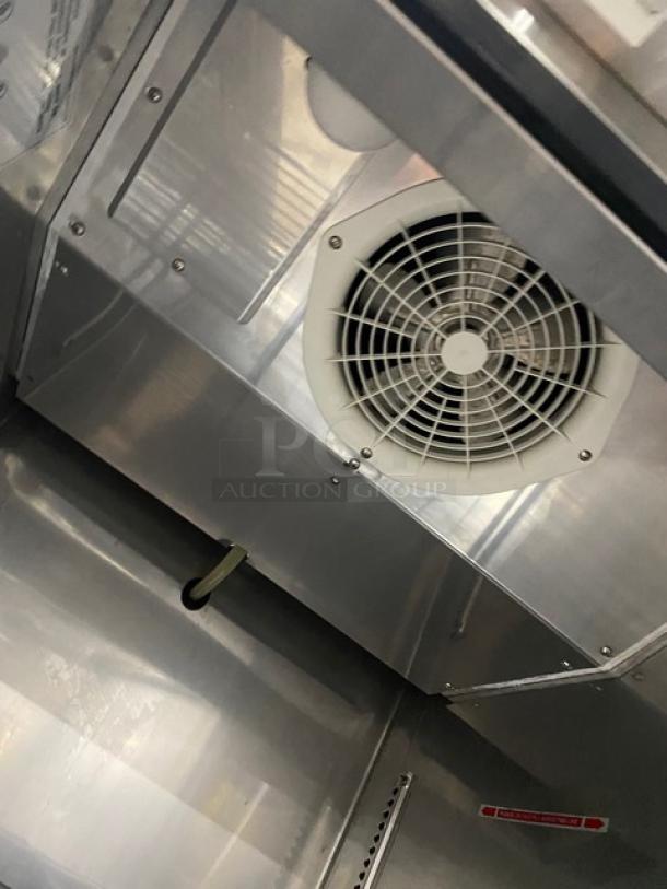 Norlake stainless steel single door reach-in refrigerator, model TR231SSS/0, with internal fan and poly-coated rack, on casters.