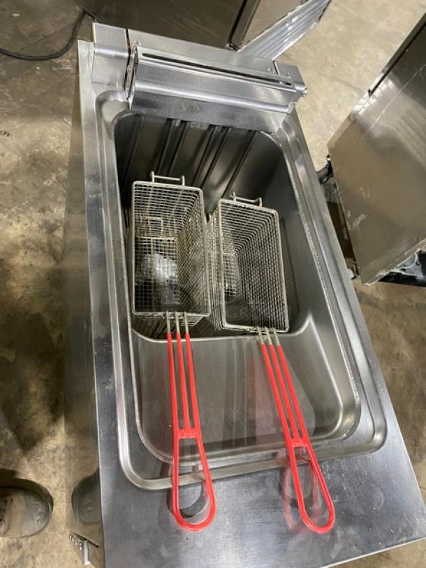 Empero commercial stainless steel deep fat fryer with fry basket, model EMPPLS7FE010USA, 208V 3 phase, on casters.