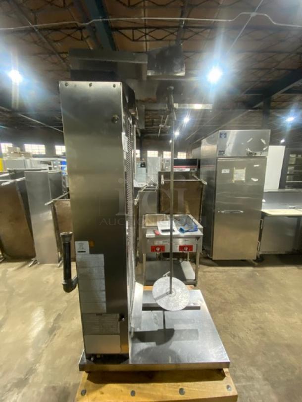 Inoksan PDG105MN commercial stainless steel gyro machine with 5 burners, chopping block base, and casters. Model: PDG105MN.