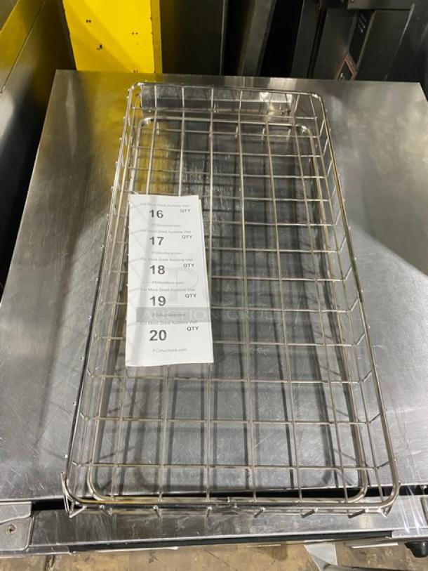 Commercial chrome-plated full-sized bagel/pastry wire rack in excellent condition with grid design, perfect for bakery use.