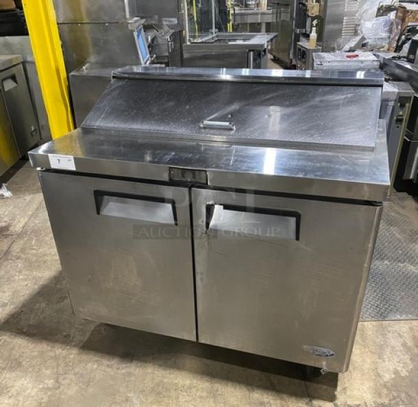 Atosa stainless steel 2-door refrigerated bain marie prep table, Model MSF8302, with poly coated rack, on casters.