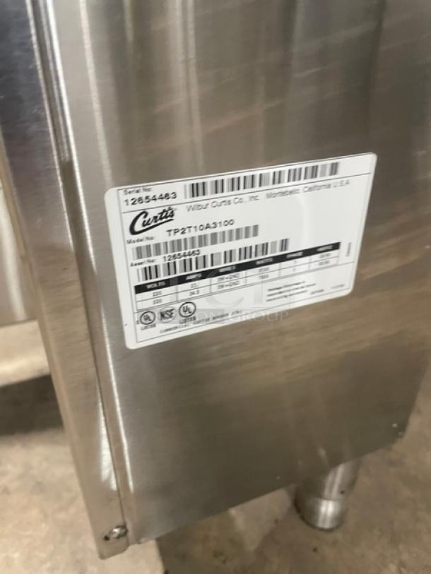 Curtis ThermoPRO TP2T10A3100 stainless steel coffee brewer with hot water dispenser, 220V, on legs, SN: 12654463.