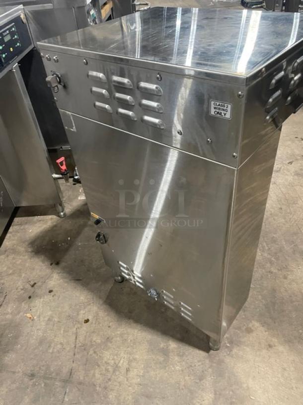 Curtis ThermoPRO Series coffee brewer, model TP2T10A3100, stainless steel, twin thermal server, 220V, on legs, with hot water dispenser.