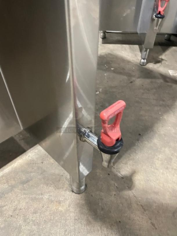 Curtis ThermoPRO TP2T10A3100 stainless steel coffee brewer with hot water dispenser, on legs, shown in used condition.