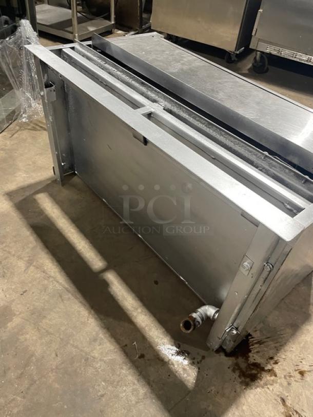 Jade Range stainless steel overhead salamander broiler, natural gas powered, commercial use, with adjustable height feature.