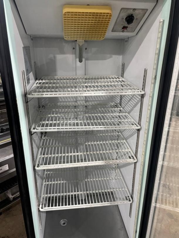 Avantco commercial refrigerator, model 178GDC10, with black finish and single glass swing door, includes poly-coated wire racks.