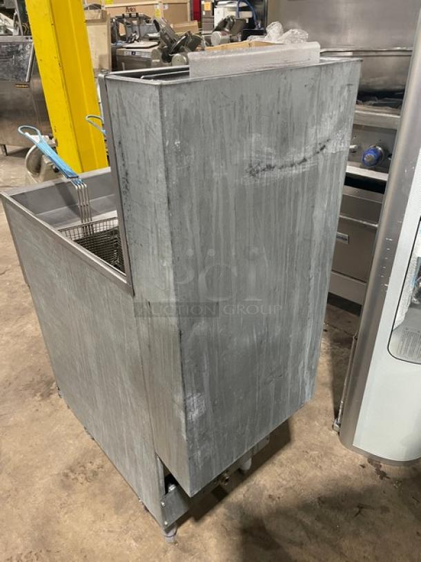 Pitco 35C+S commercial stainless steel 35 lb. deep fat fryer with backsplash, fry baskets, propane-powered, used condition.