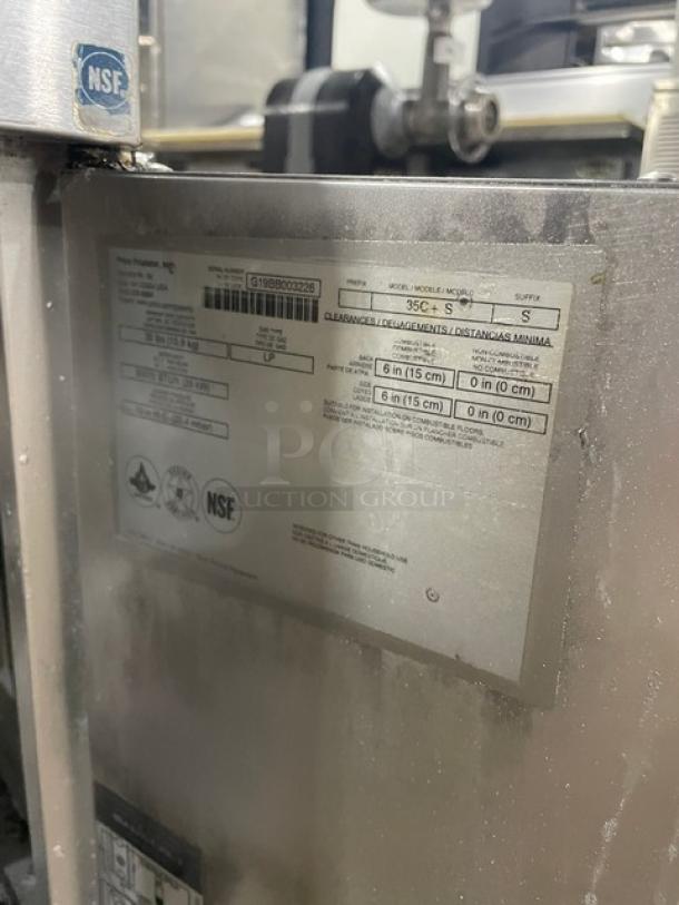 Pitco 35C+S stainless steel liquid propane fryer, 35 lb. capacity, with back splash and fry baskets, NSF certified. SN: G19BB003226.