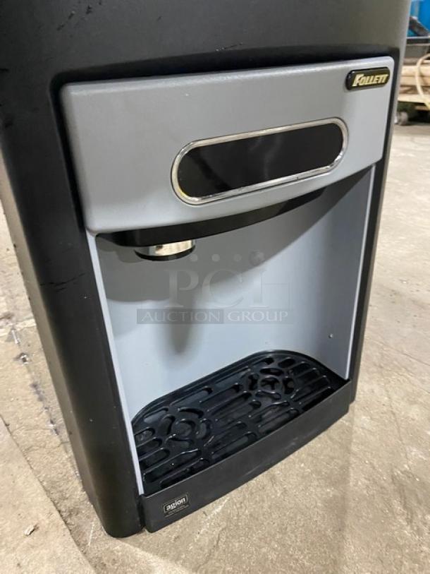 Follet 15CI100A commercial stainless steel ice/water dispenser, 2016 model, electric powered, with drip tray, excellent condition.