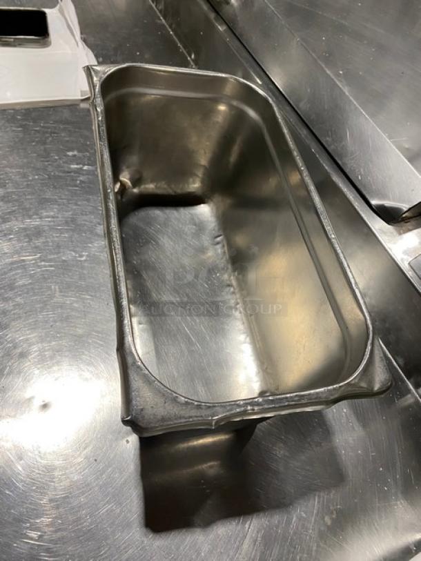 Commercial stainless steel steam table pan, rectangular, polished finish, used condition, suitable for hotel use.