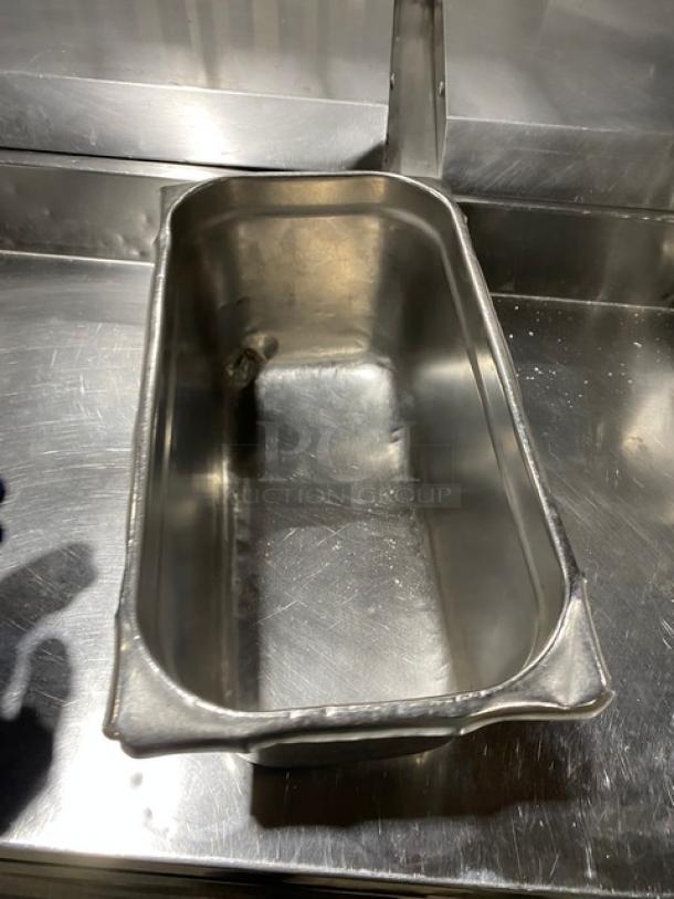 Stainless steel hotel steam table pan, commercial grade, in good condition, dimensions 11x, smooth finish.