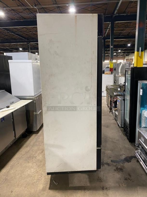 True GDM-72 commercial triple glass door refrigerator, poly-coated wired rack, beverage organizer, used condition, serial 1-2207152.