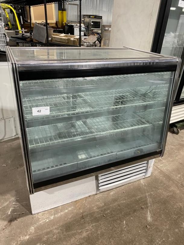 Commercial 48" white refrigerated deli display case with glass front, poly-coated wired rack, and rear sliding doors.