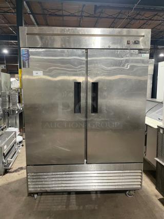 Duker's Commercial Stainless Steel Solid 2 Door Reach In Upright Freezer! With Poly Coated Wired Rack! Model: D55F SN: 1098000DUK200803200900777! 115V! On Casters! - Item #1209739
