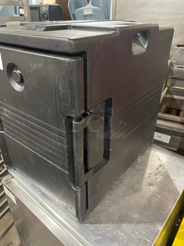 Cambro Ultra Series black front-loading insulated food pan carrier in good condition, with sturdy handles and secure latch.