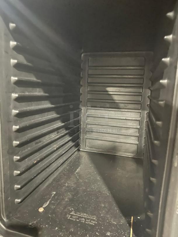 Cambro Ultra Series black front-loading insulated food pan carrier, interior view, showing slots for pans, good condition.