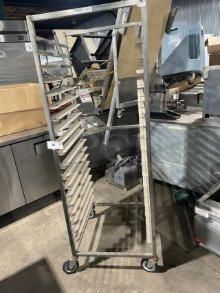 Channel heavy-duty pan rack on casters, robust stainless steel design, multiple shelves for efficient transport and storage.