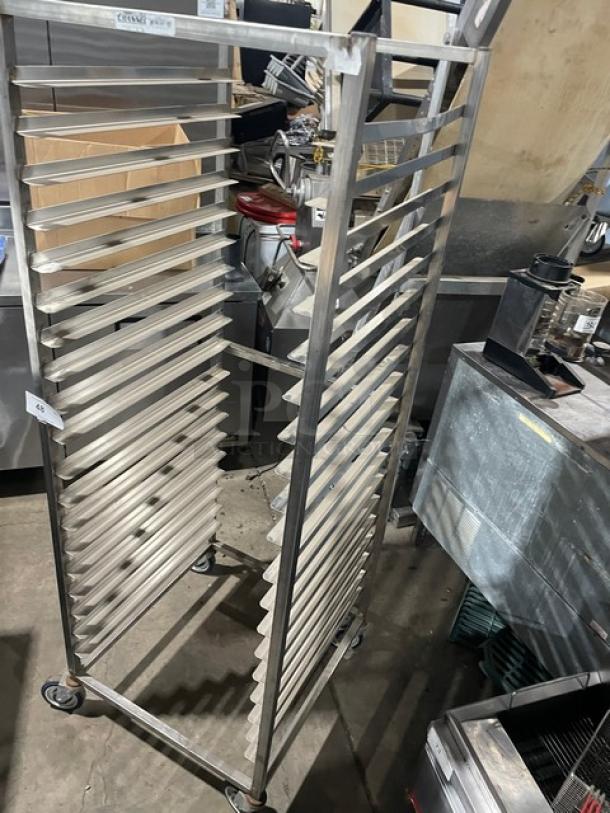 Channel commercial heavy-duty pan holding/transport rack, stainless steel, with casters for mobility, in good condition.