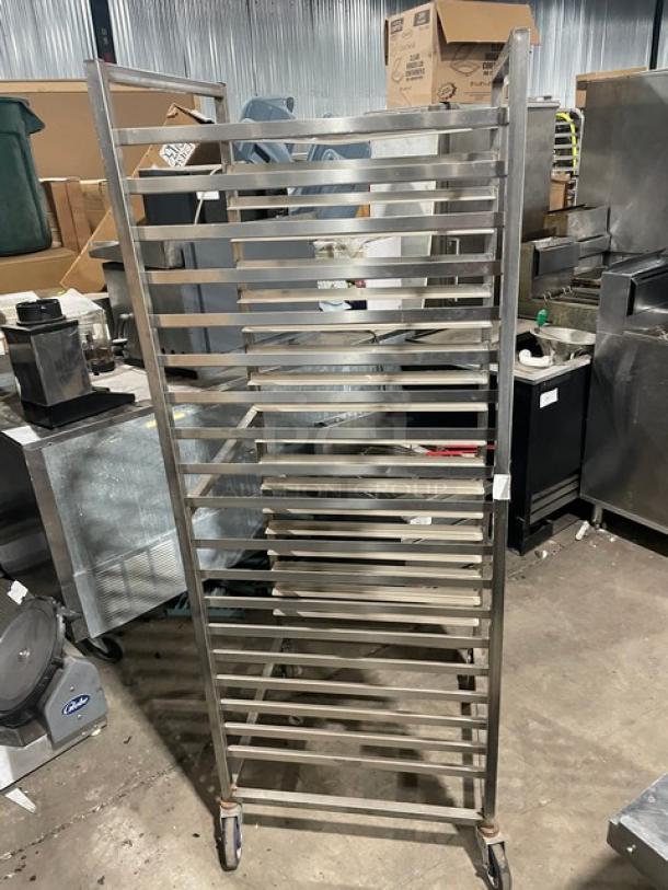 Channel commercial heavy-duty pan holding/transport rack, stainless steel, has several shelves, on casters, used condition.