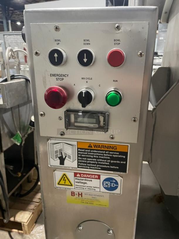 Attias Magna Mixer, Model 50H-4C1 control panel. Features emergency stop, mix cycle, and run buttons. Warning labels visible.