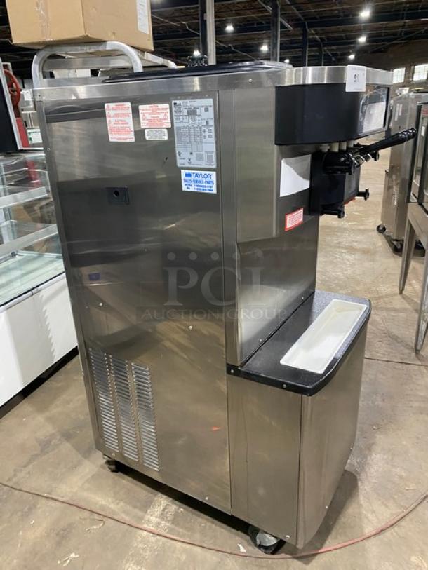 Taylor C71333 stainless steel soft serve machine with dual flavor, twist option, and two hoppers. Model C713-33, 208-230V, 3-phase, on casters.