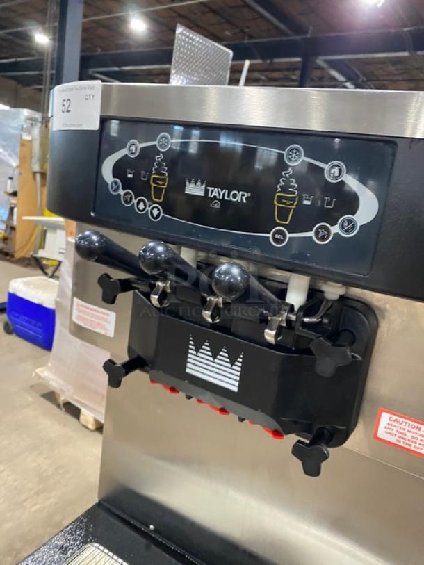 Taylor C713-33 soft serve machine with dual flavor and twist feature. Stainless steel, 208-230V 3-phase, on casters. Serial: K8116793.