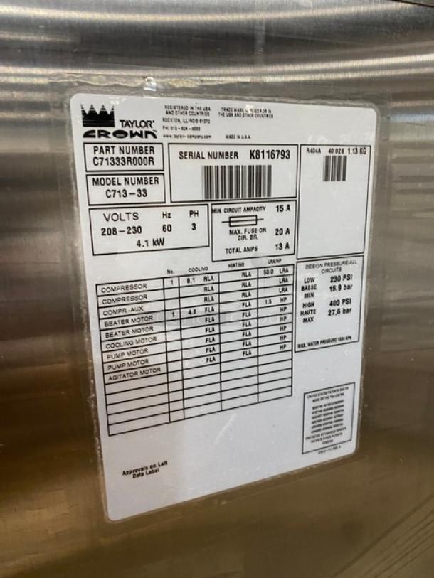 Taylor C713-33 stainless steel dual flavor ice cream machine label, model C713-33, SN K8116793, 208-230V, 3 phase.
