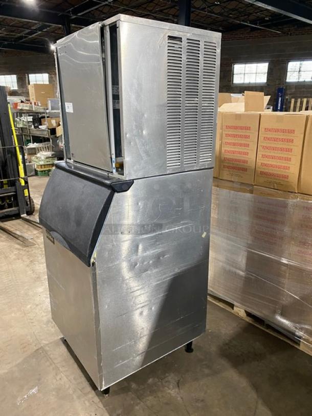Ice-O-Matic CIM1136HA4 stainless steel ice maker, air-cooled, on legs, 208-230V, 1 phase, commercial use, visible wear.