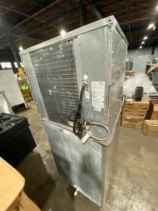 Ice-O-Matic Elevation CIM1136HA4 ice maker, stainless steel, air-cooled, on legs, model label visible, commercial use.