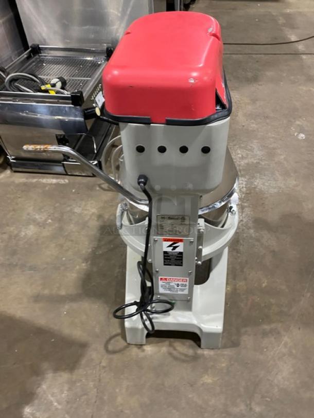 Centaur MAC20 commercial electric 20 Qt. planetary mixer with red top, stainless bowl guard, bowl, whisk, beater, and dough hook.
