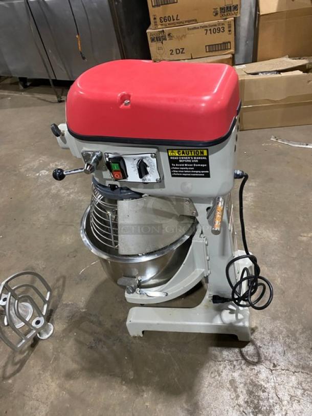 Centaur MAC20 commercial 20 Qt. planetary mixer with stainless steel bowl, bowl guard, whip, flat beater, and spiral dough hook.