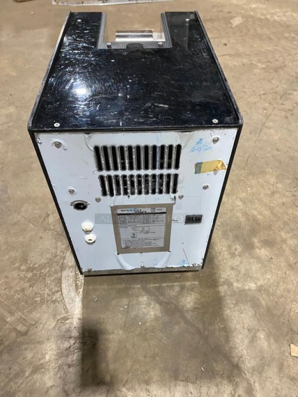 Snow Van NSD-151MW stainless steel electric ice machine, countertop model. Visible wear, 220V, commercial use.