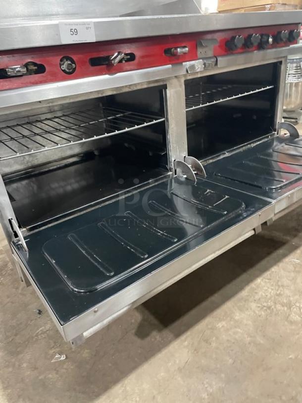 Vulcan commercial stainless steel range with split-top griddle, 4-burner, double oven, wired rack, and backsplash.