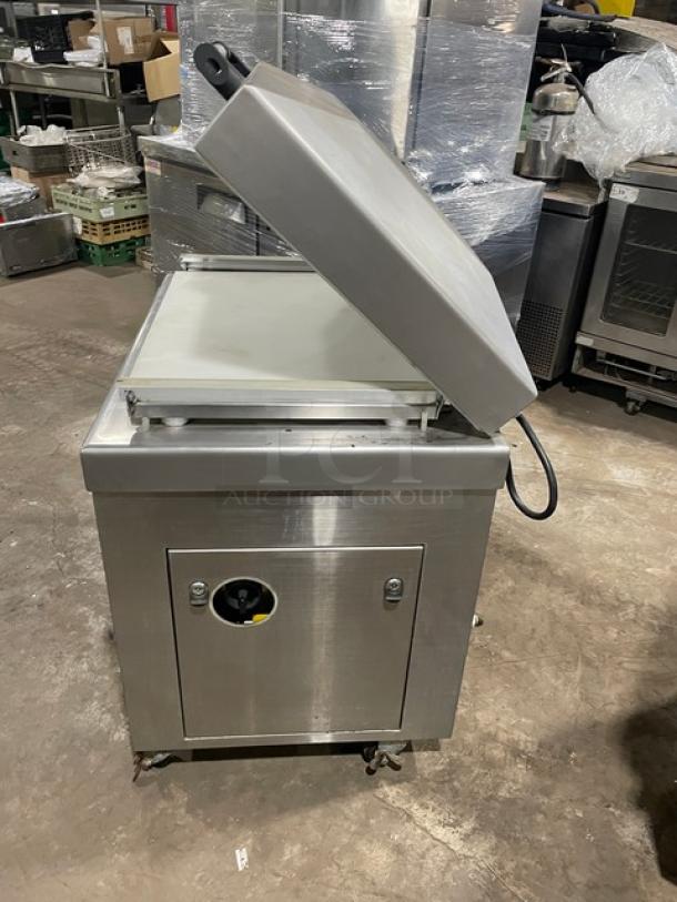 Promax stainless steel electric vacuum tray sealer with digital controls, single chamber, on casters, used condition.