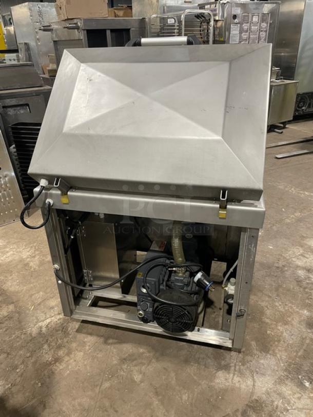 Promax stainless steel electric vacuum tray sealer with digital controls, single chamber, on casters, functional condition.