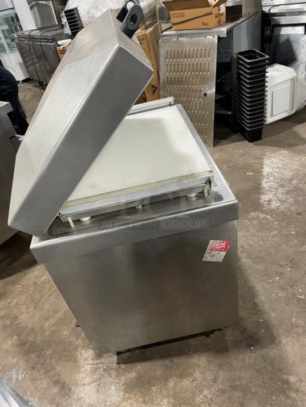 Promax stainless steel single chamber vacuum tray sealer with digital controls, on casters, used condition, working when removed.