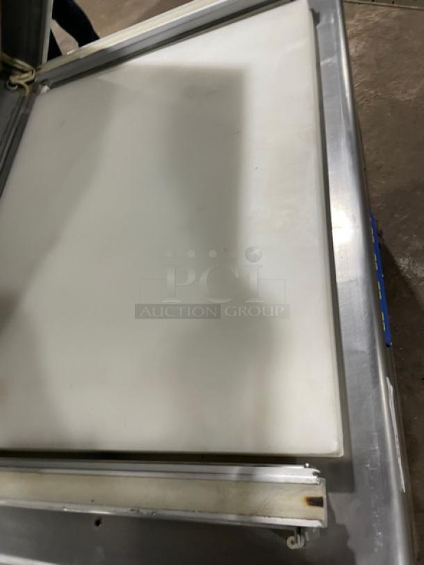 Promax stainless steel electric vacuum tray sealer with digital controls, single chamber, on casters, good condition.